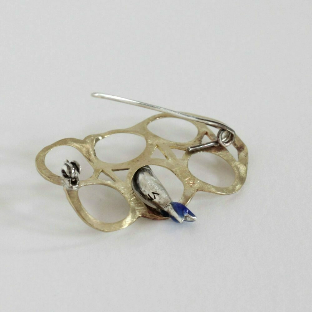 Brass and silver brooch