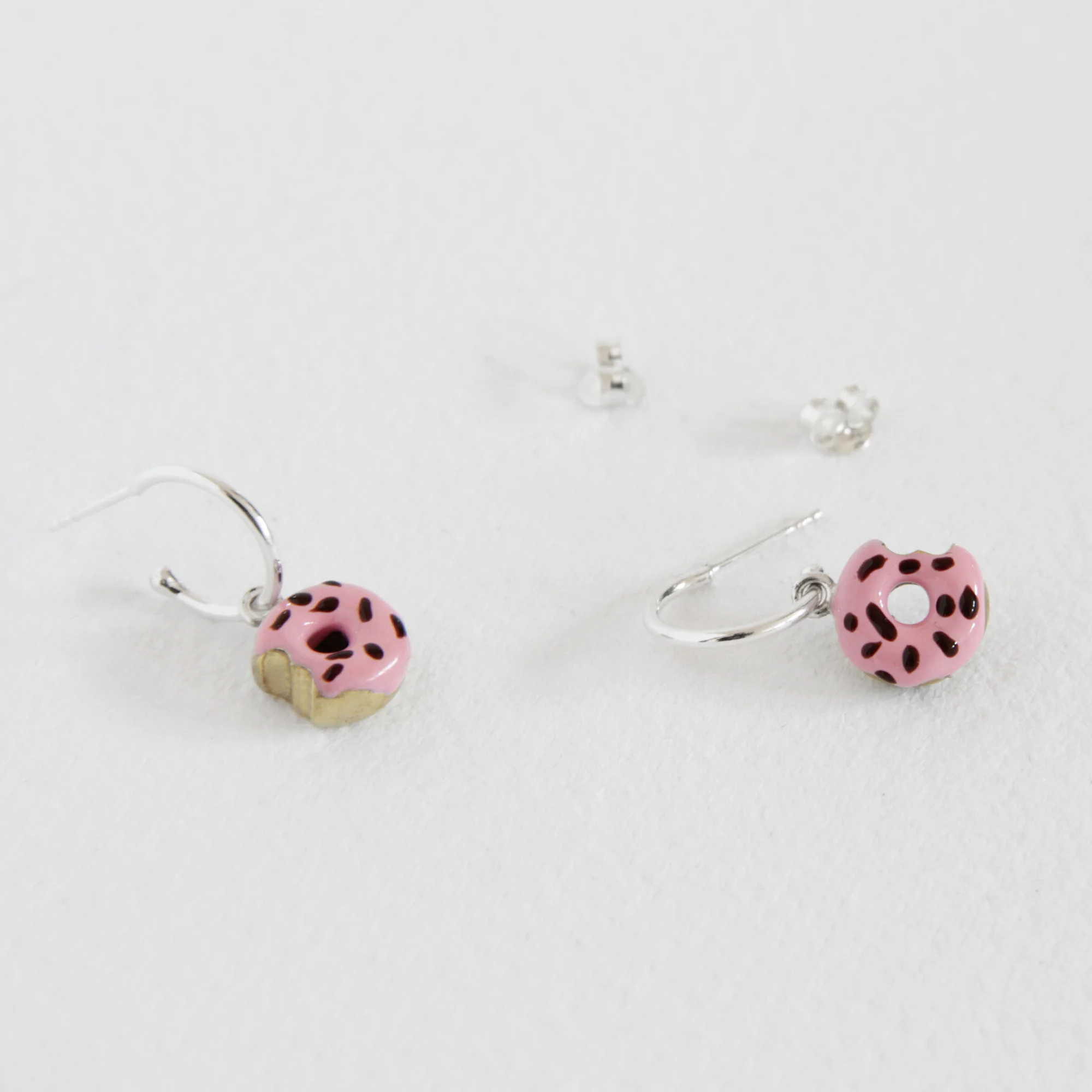 Silver hoop earrings, Pink donuts